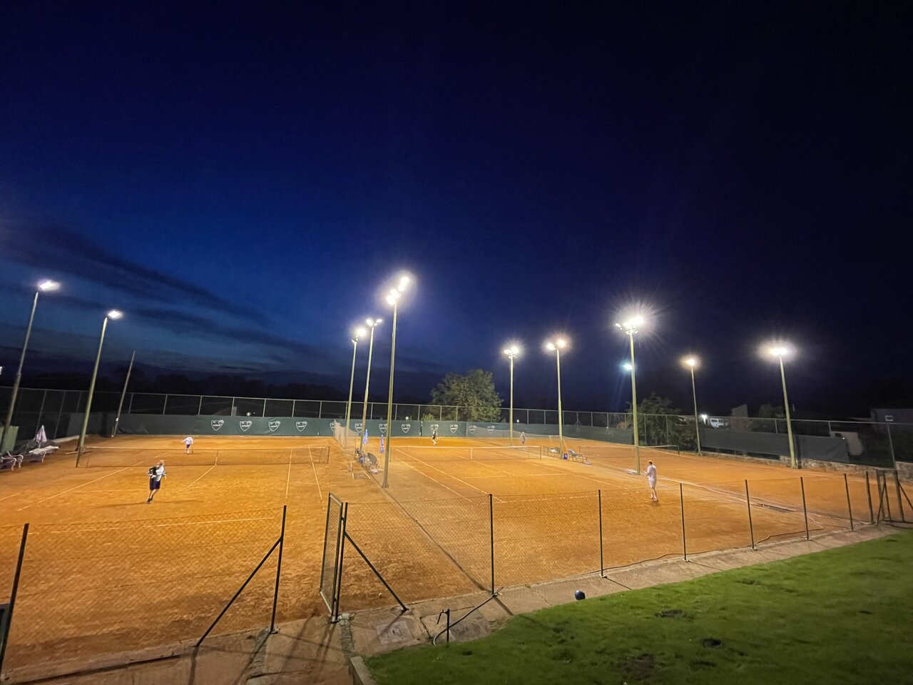 Tennis courts lit at night